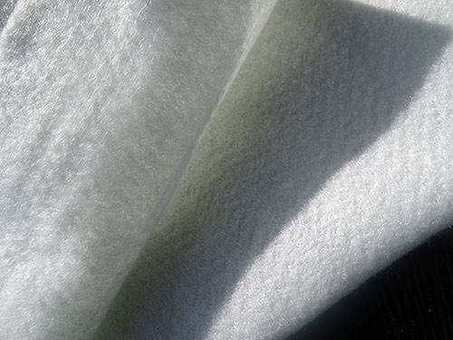 聚酯长丝烧毛国内精品久久久久久久影视麻豆布铺设时候应注意什么？